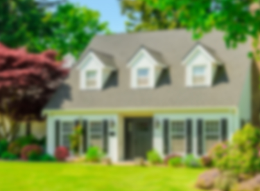 A blurry two story home.