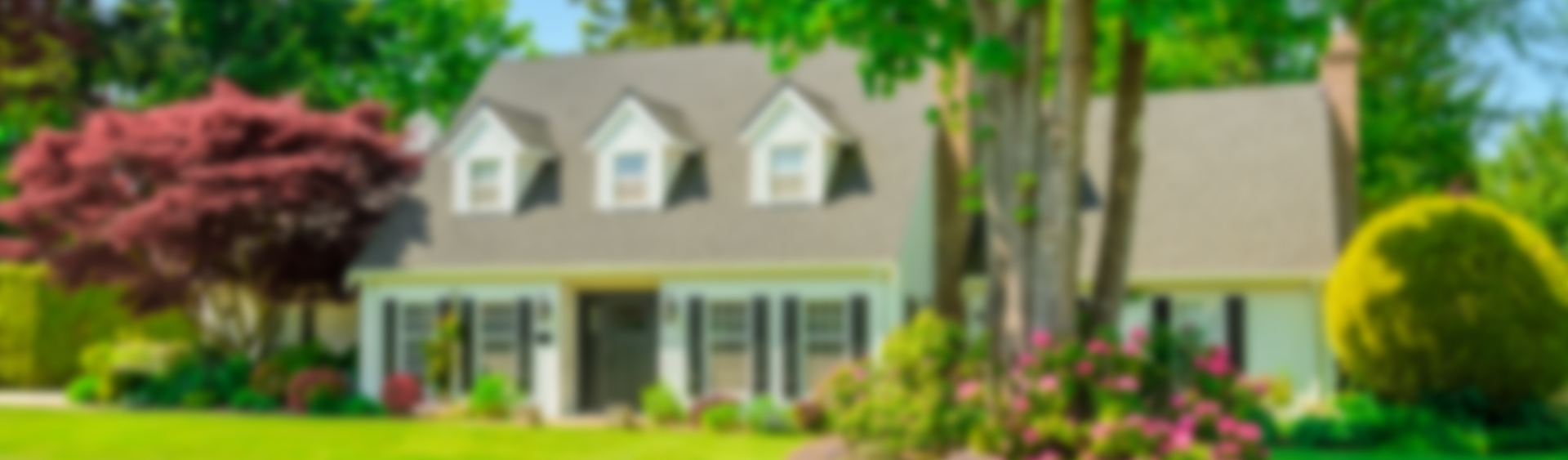 A blurry two story home.